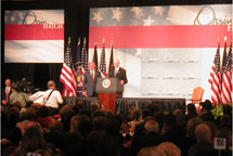 President Bush with United States Senator Orrin Hatch - Flags in the Background